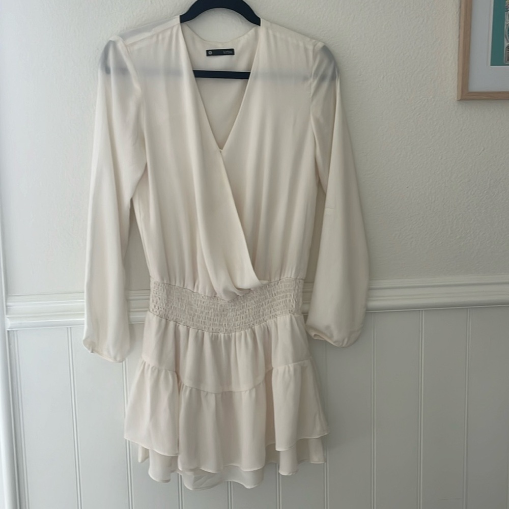 Revolve Krisa Smocked Surplice Mini Dress with Long Sleeves in Cream White